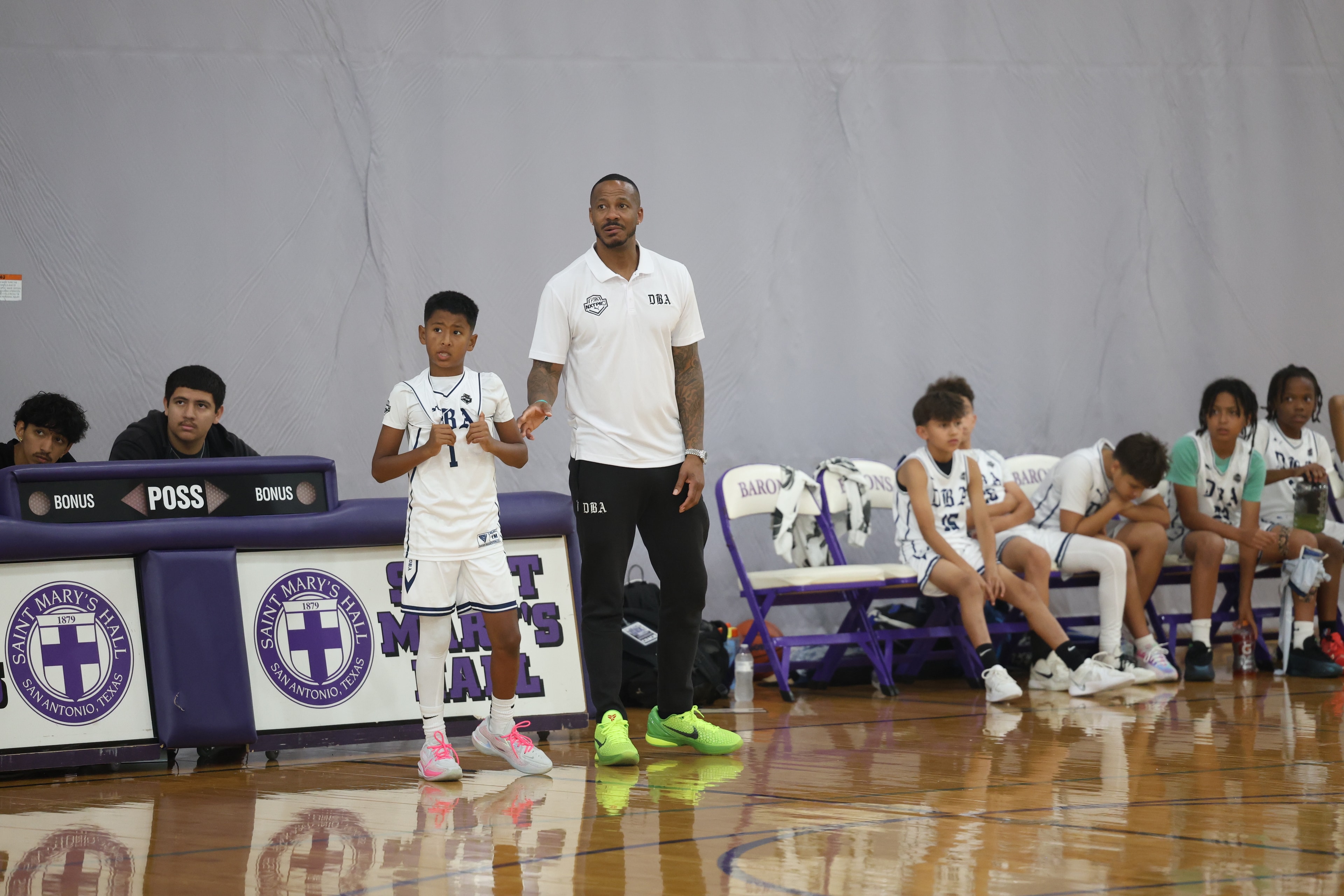 Coach Sean Dockery on the sideline with DBA players